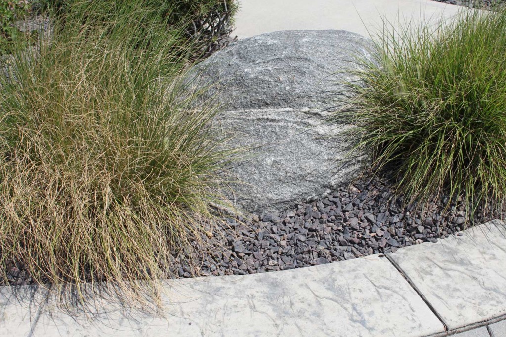Landscape feature with decorative gravel trap rock from Green Stone | Noblesville and Indianapolis, Indiana