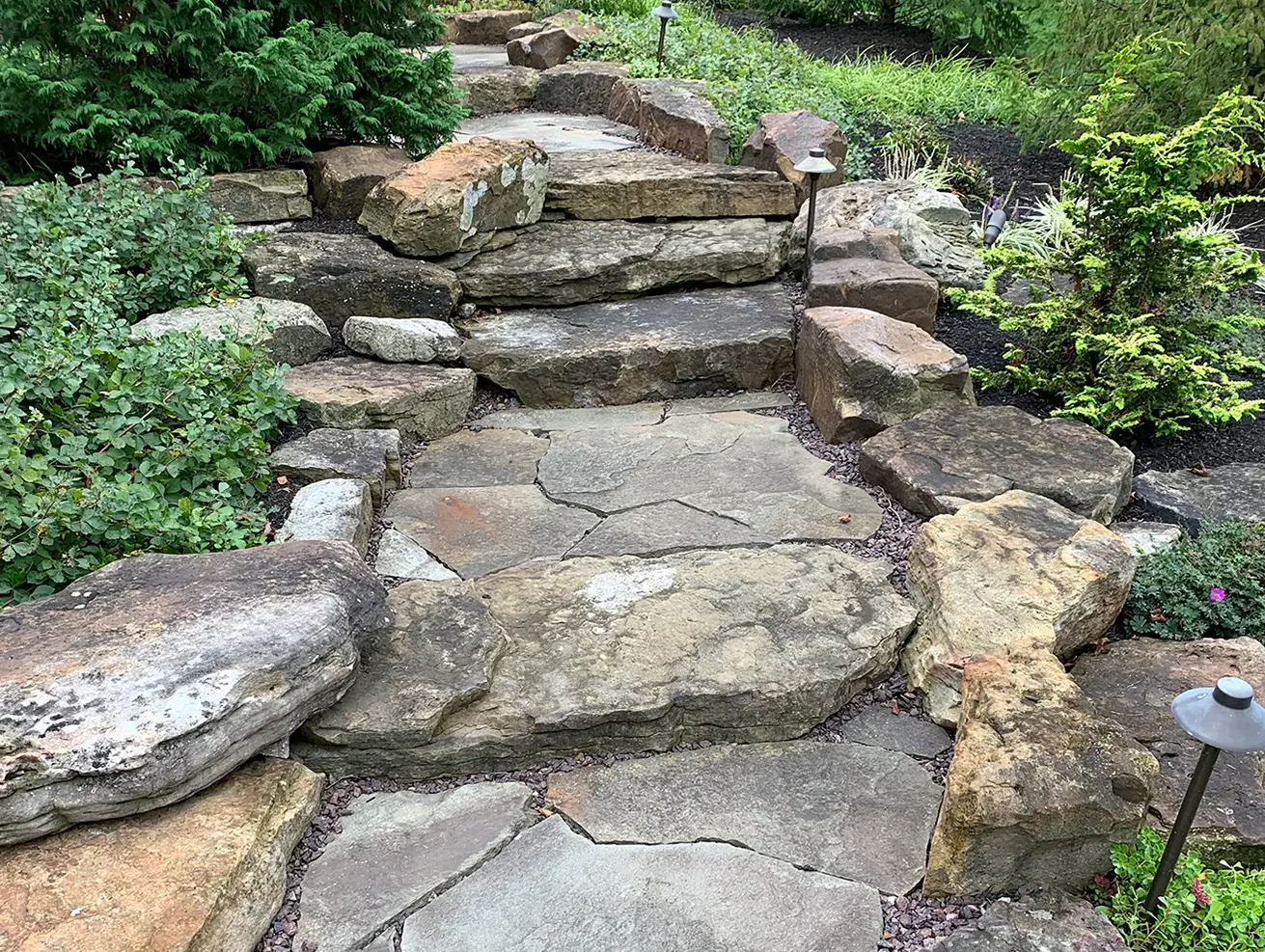 Weathered Sandstone 18″-24″ | Boulders & Ledgerock 18_inch-24-inch_weathered_sandstone_boulders_landscape_natural_stone_finished_project-1-B-WSS0090_1824