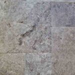 silver-gray-travertine-patio-pool-deck-stone-patterned-natural-stone-supplier-greenstone-hardscape-supply