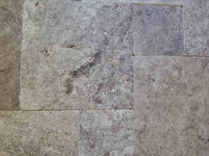 silver-gray-travertine-patio-pool-deck-stone-patterned-natural-stone-supplier-greenstone-hardscape-supply