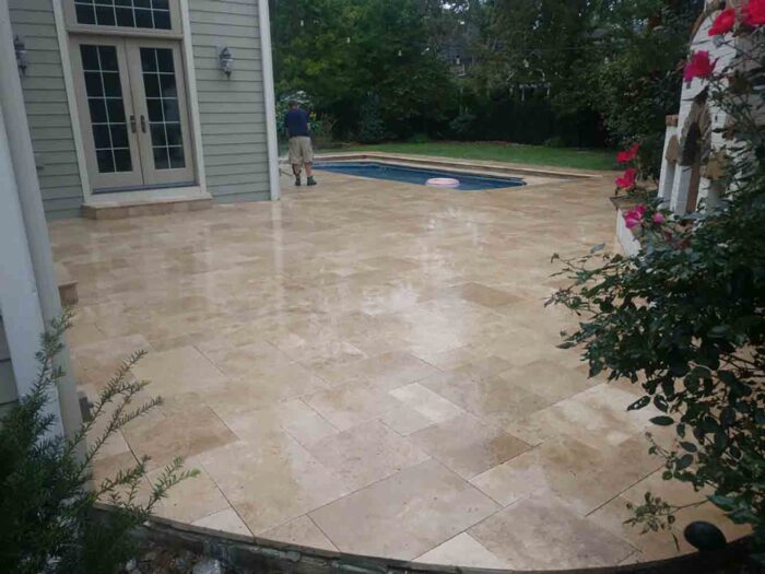 walnut-paver-travertine-patio-pool-deck-stone-patterned-natural-stone-supplier-greenstone-hardscape-supply